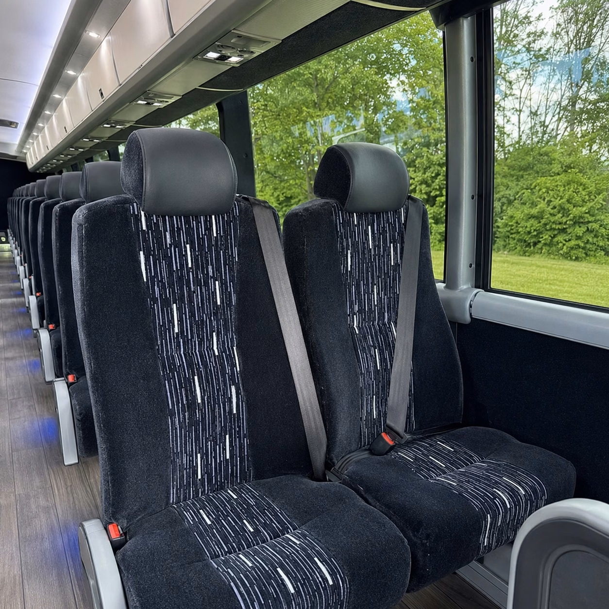 how trip distance and duration affect little rock charter bus rates